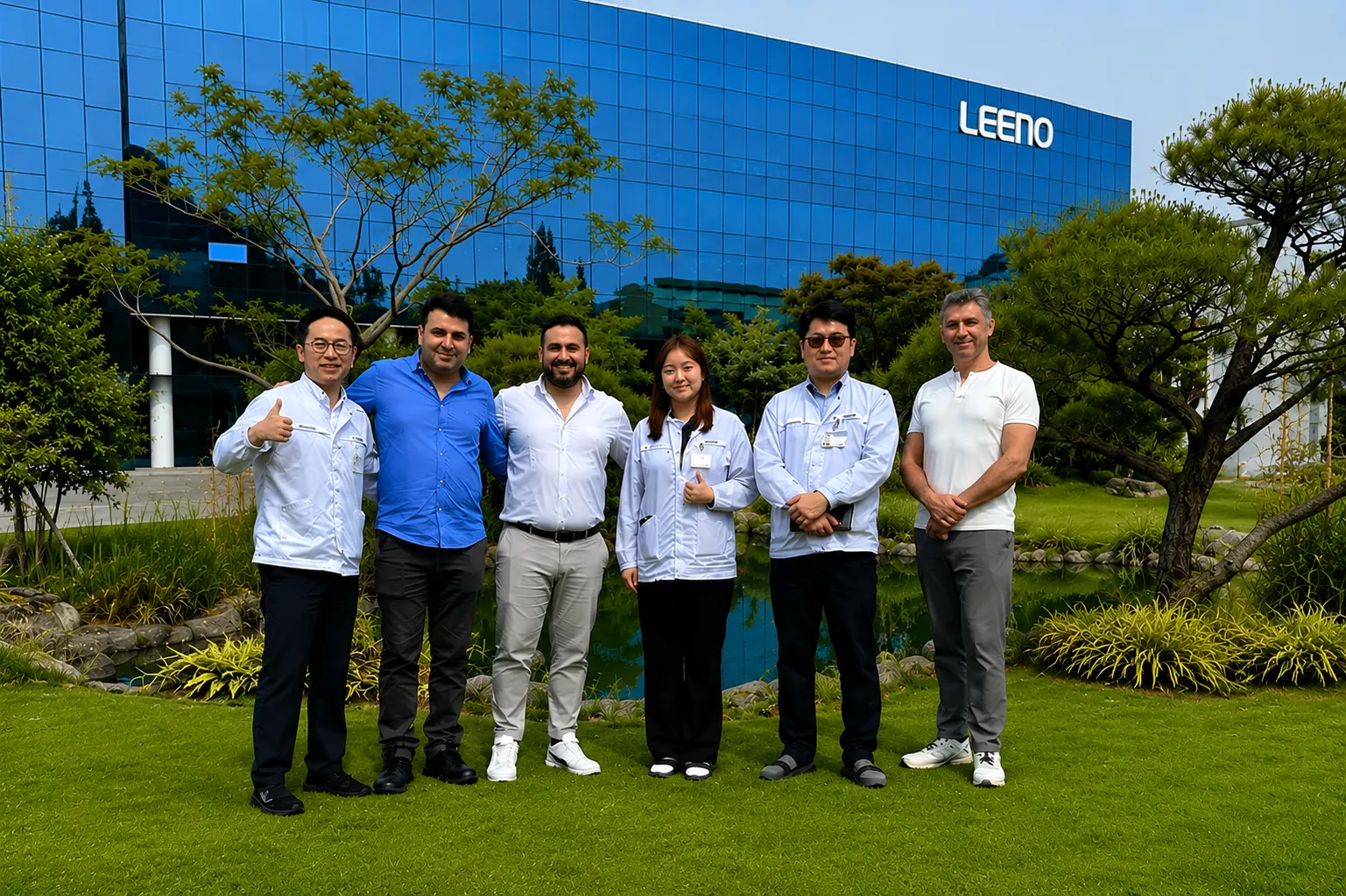 SAS and Leeno teams together outside the Leeno facility